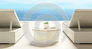 Minimal Luxury beach house with sea view on terrace modern design, Sunbed Lounge chairs on deck at vacation home or hotel . 3d