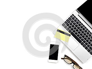 Minimal and Modern white office desk with laptop and glasses and