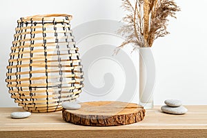 Minimal natural wood home decor with pine wood disc pedestal with bark.