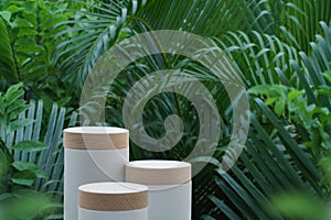 Minimal podium table top outdoors blur green leaf tropical forest plant background.beauty cosmetic healthy natural product