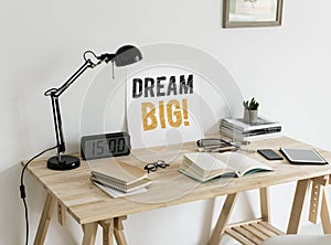 Minimal style workspace with a wording Dream big