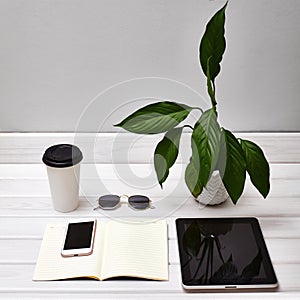 Minimal Work Desk with Tablet, Smartphone, Note and Coffee. Office Freelancer Table. Stylish Work Place with Accessories