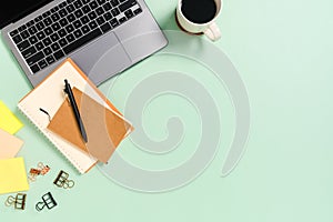 Minimal work space - Creative flat lay photo of workspace desk. Top view office desk with laptop, coffee cup and notebook on