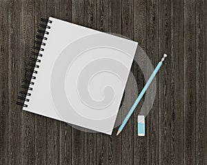 Minimal work space : notebook with blue pencil, eraser on wooden