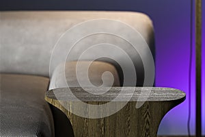 Minimalism style. Beige design comfortable couch with wooden stylish coffee table on violet gradient background. 3d