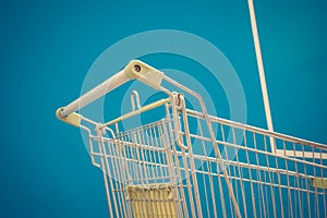 Minimalism style, Shopping cart and blue wall.