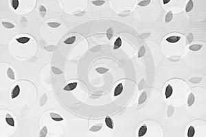 Minimalist abstract black-and-white background with circles and black leaves.