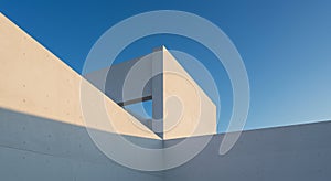 Minimalist architectural structure with clean lines, featuring intersecting white concre