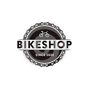 Minimalist badge emblem bicycle, bike, bike shop, bike club logo icon vector illustration with chains and abstract bicycle concept
