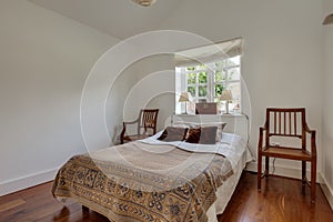 Minimalist bedroom interior in English cottage