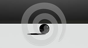 Minimalist black orb on a gray white background