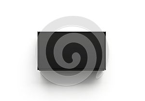 Minimalist black rectangular object casting a shadow on a white background