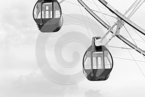 Minimalist black and white Ferris Wheel on amusement park