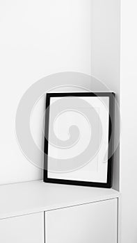 Minimalist black white picture frame with passe-partout mockup. Interior poster mock-up