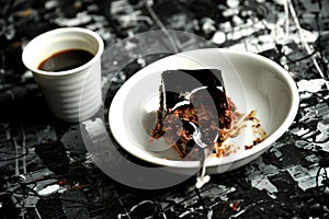 Minimalist breakfast with coffee and chocolate cake