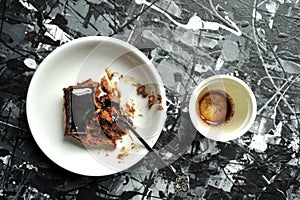 Minimalist breakfast with coffee and chocolate cake