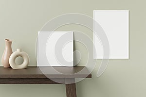 Minimalist and clean white poster or photo frame mockup on the wooden table leaning against the room wall with decorative vase. 3D