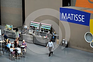 Minimalist coffee shop with seating inside Tate Modern Art Gallery London England