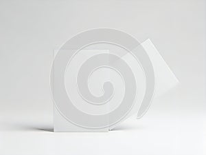 A minimalist composition of two white rectangular blocks