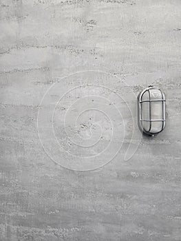 Minimalist Concrete Wall with Industrial LightFixture