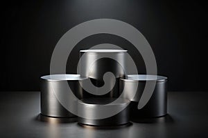Three black cylindrical podiums on a black background