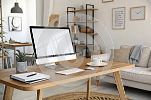 Minimalist home office with computer mockup photo