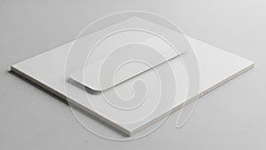 Image featuring a square flat white surface placed on a light