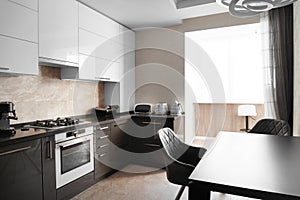 Minimalist kitchen interior with built-in electronics