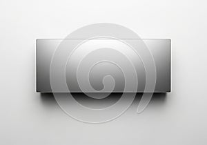 Minimalist metallic rectangular object against a plain background