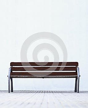 Minimalist park bench with white background photo