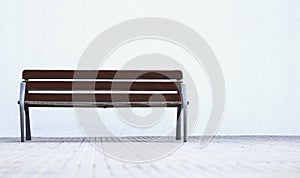 Minimalist park bench with white background photo