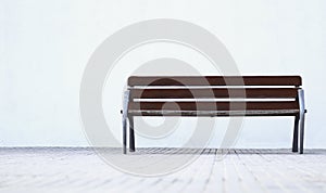 Minimalist park bench with white background photo