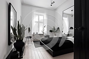 minimalist room, with white walls and black accents, ready for a makeover