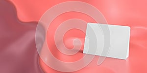 A minimalist scene featuring a white rectangular object on a pink reflective surface backdrop