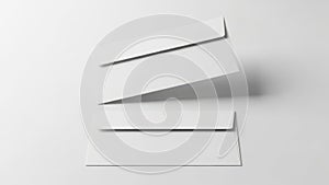 Minimalist stack of white paper sheets on a clean surface