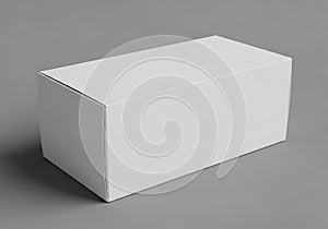 A simple white rectangular box presented on a plain gray background surface