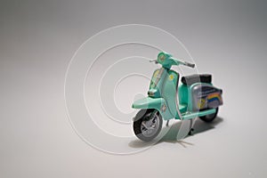 Minimalist toy bike on white background