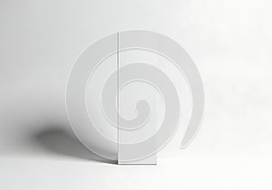 Minimalist white box with dramatic shadow on a white background