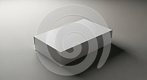 Minimalist white box on a textured gray surface