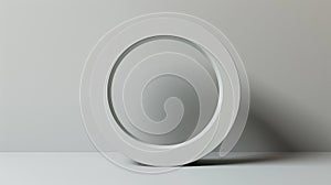 Minimalist white circular object on a neutral background