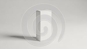 Minimalist white rectangular block casting a subtle shadow on a plain surface