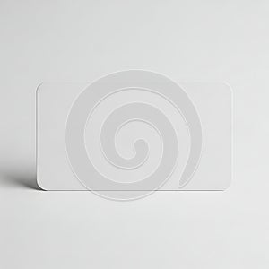 Minimalist white rectangular object against a plain background
