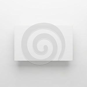 A minimalist white rectangular object against a plain white background