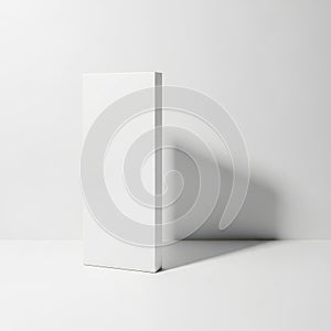 Minimalist white rectangular object casting a soft shadow on a plain background