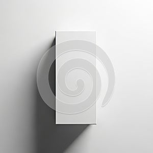 Minimalist white rectangular object casting a subtle shadow on a plain background