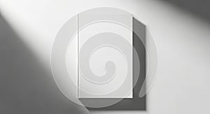 Minimalist white rectangular object with dramatic diagonal light and shadow