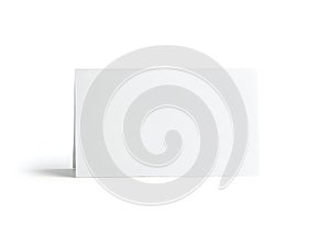 Minimalist white rectangular object with subtle shadow on a white background