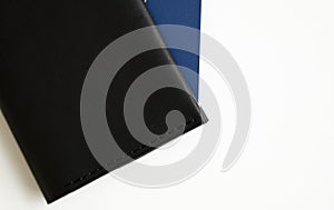 Minimalistic black leather passport cover on white background