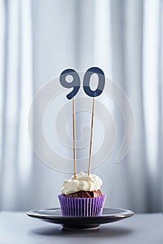 Minimalistic chocolate anniversary cupcake number 90 ninety