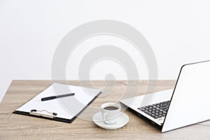 Minimalistic composition of workplace with laptop and stationery